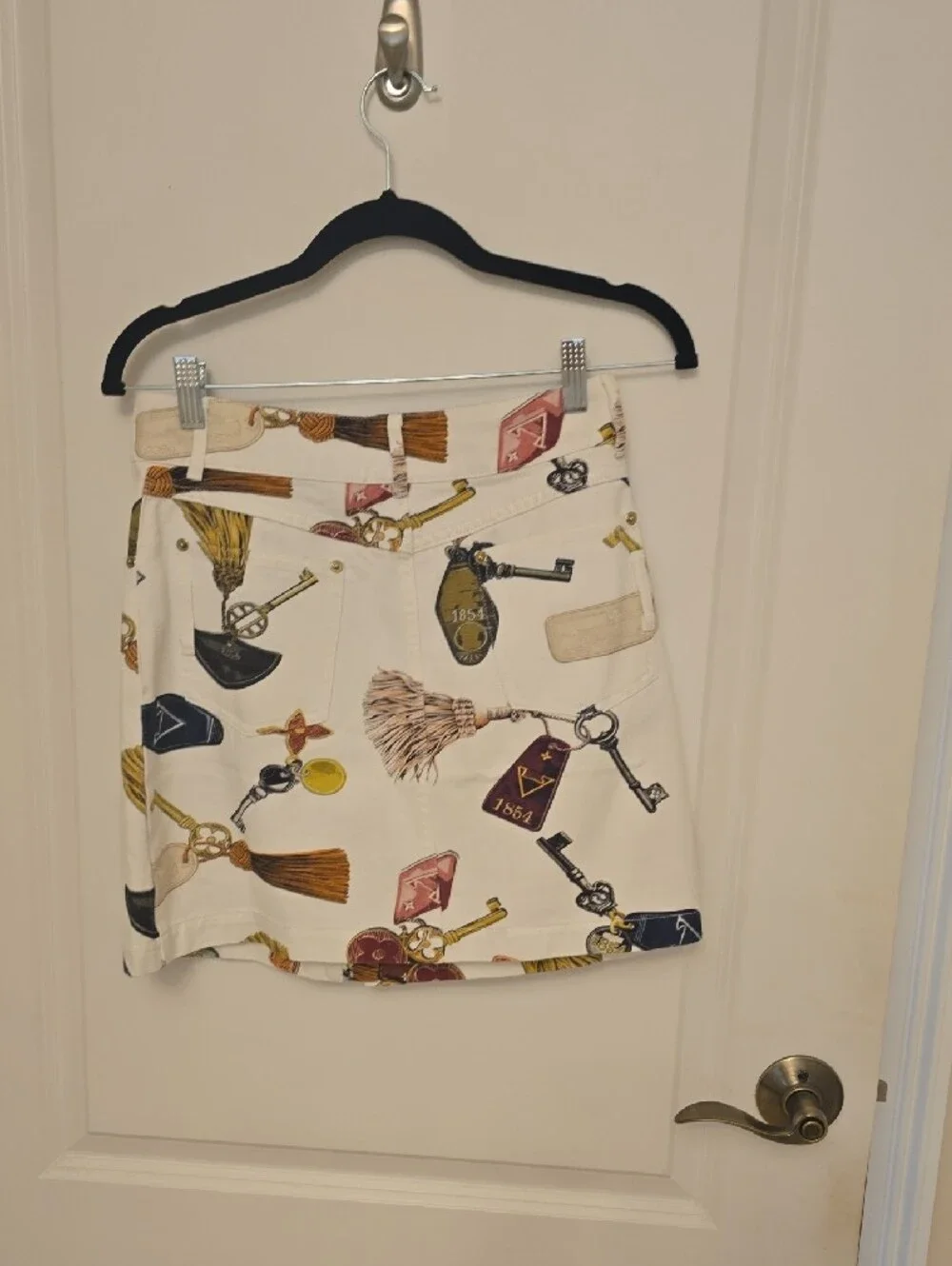 Louis Vuitton Cream Mini Skirt with Key & Tassel Print